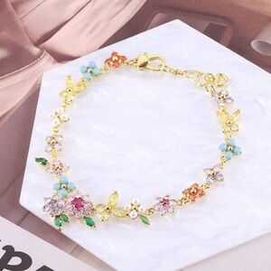 NWT Kate Spade butterfly and flower bracelet Floral Multicolor Bracelet